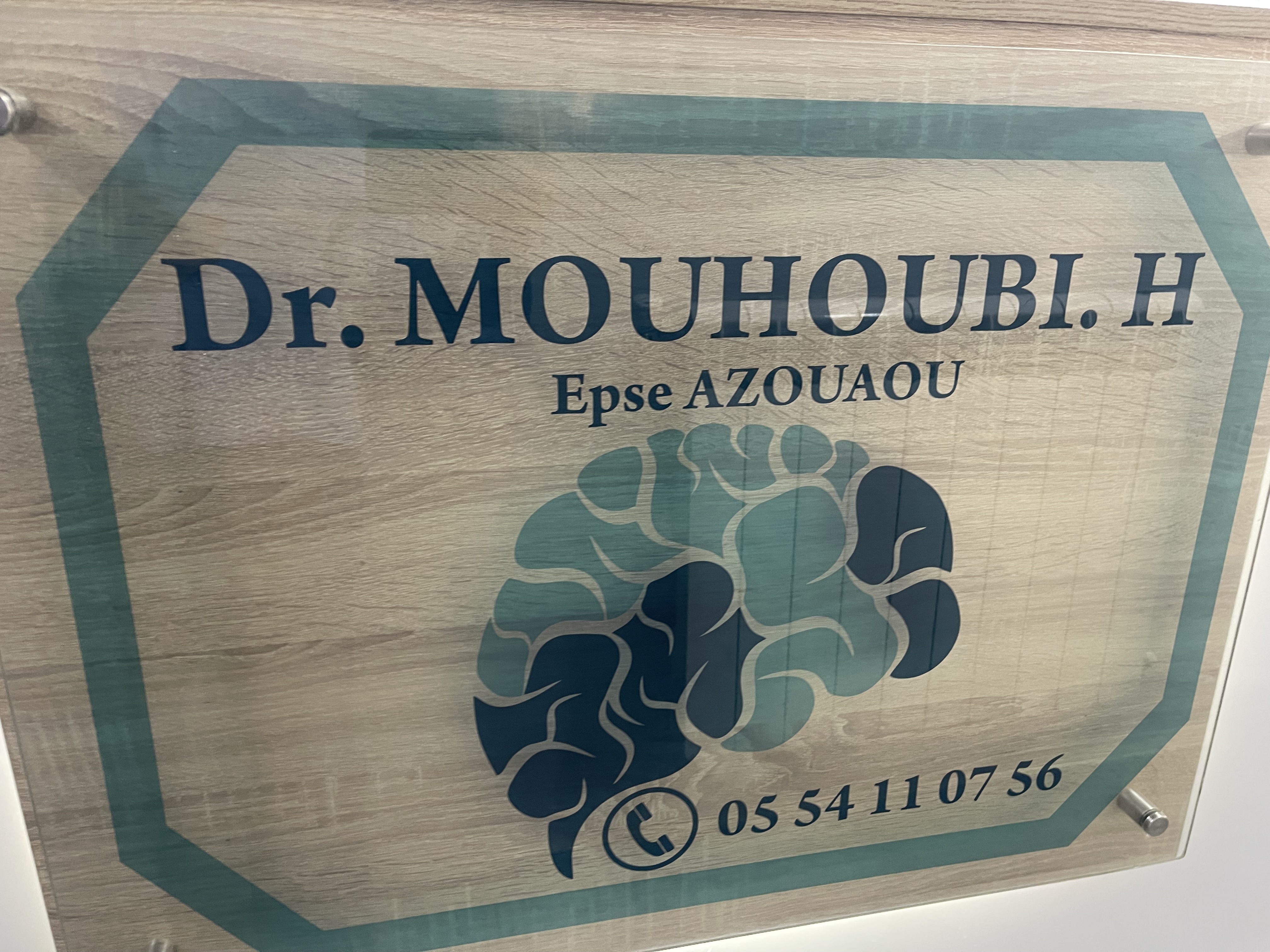 Dr. Mouhoubi H